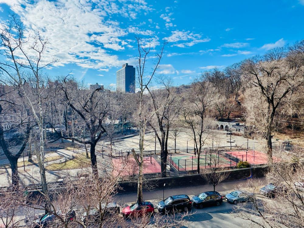 1825 Riverside Drive, Unit 5B Manhattan, NY 10034 - Photo 18 of 19 a view of a lake with houses