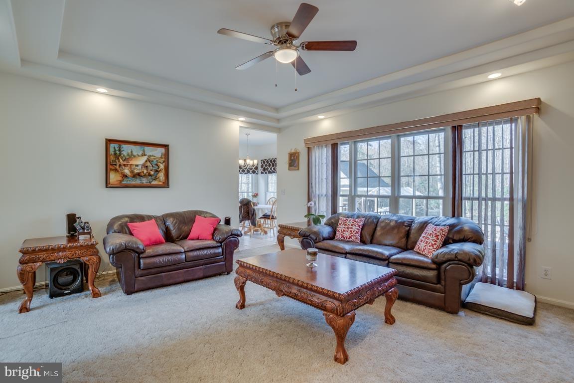 1189 Mountain View Road Fredericksburg, VA 22406 - Photo 14 of 40 Family room features tray ceilings - ceiling fan