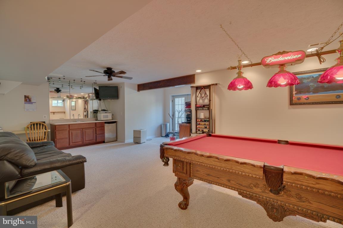 1189 Mountain View Road Fredericksburg, VA 22406 - Photo 36 of 40 Large rec room / game room / walk up entrance