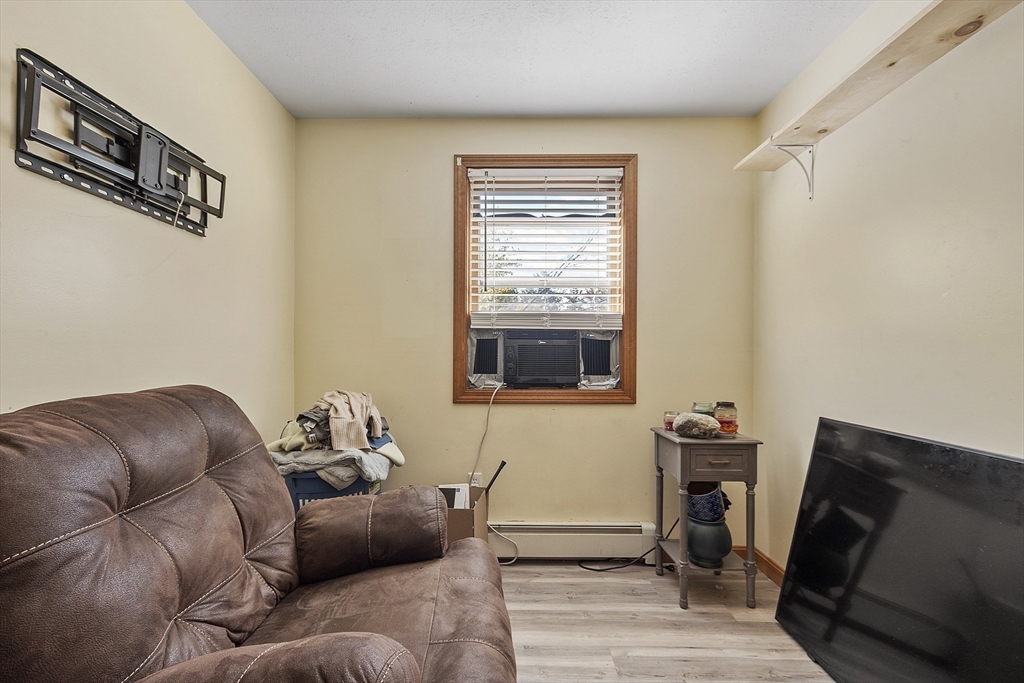 28 Old County Road Ashburnham, MA 01430 - Photo 12 of 30 a living room with furniture and a window