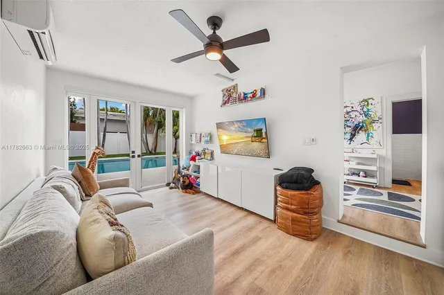 a bed room with a bed and a window