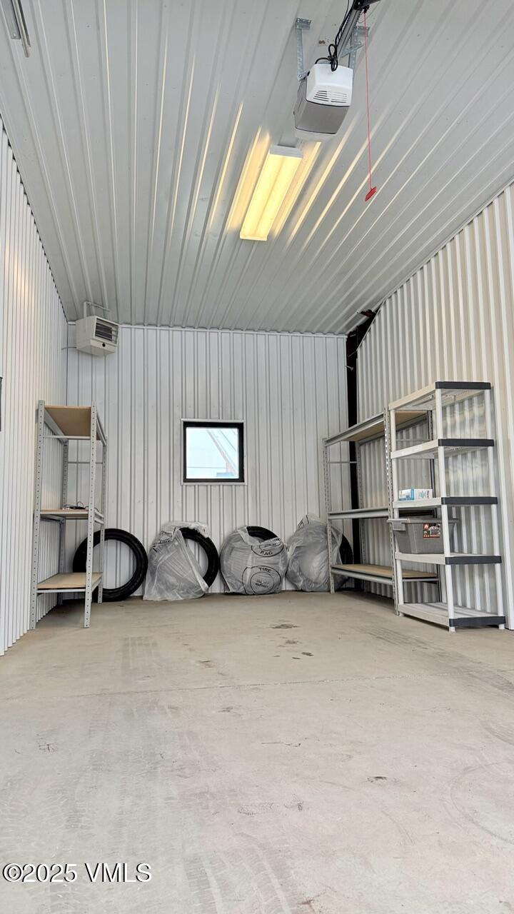 55 Spring Creek Circle, Unit 5 Gypsum, CO 81637 - Photo 6 of 7 a view of a livingroom with furniture and staircase