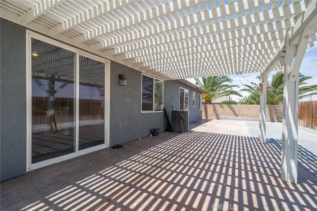 a house view with a backyard space