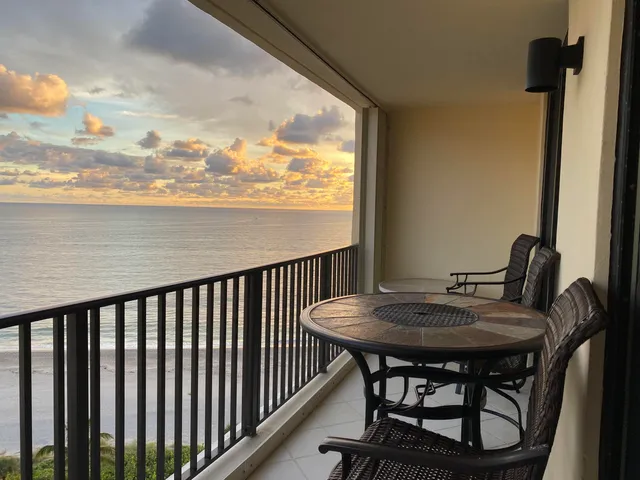 a view of a balcony dining area