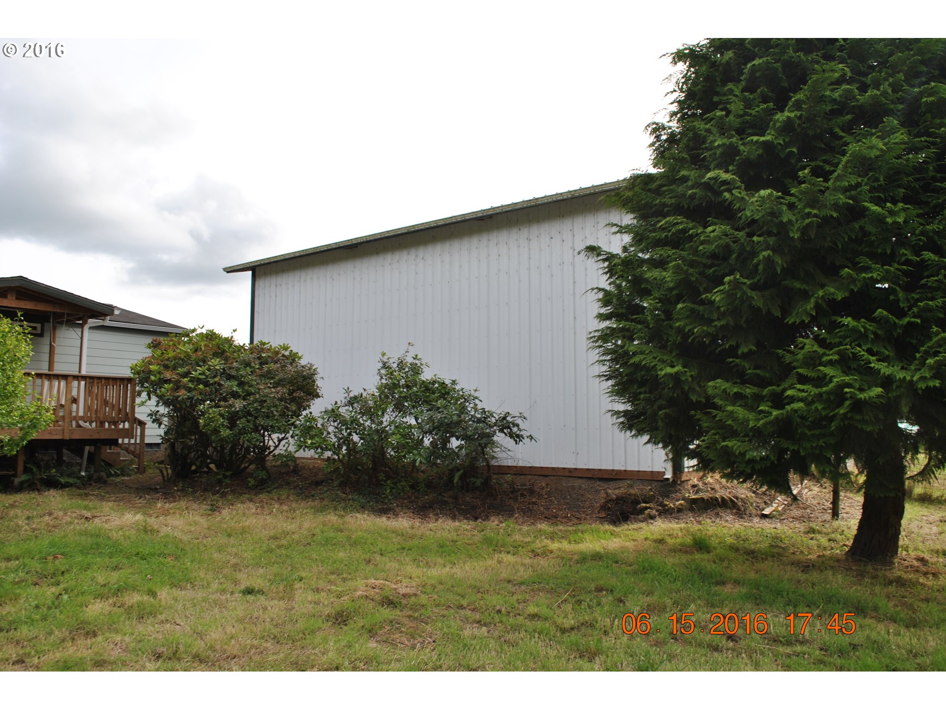 3195 Goeres Road Tillamook, OR 97141 - Photo 17 of 26 a backyard of a house with lots of green space
