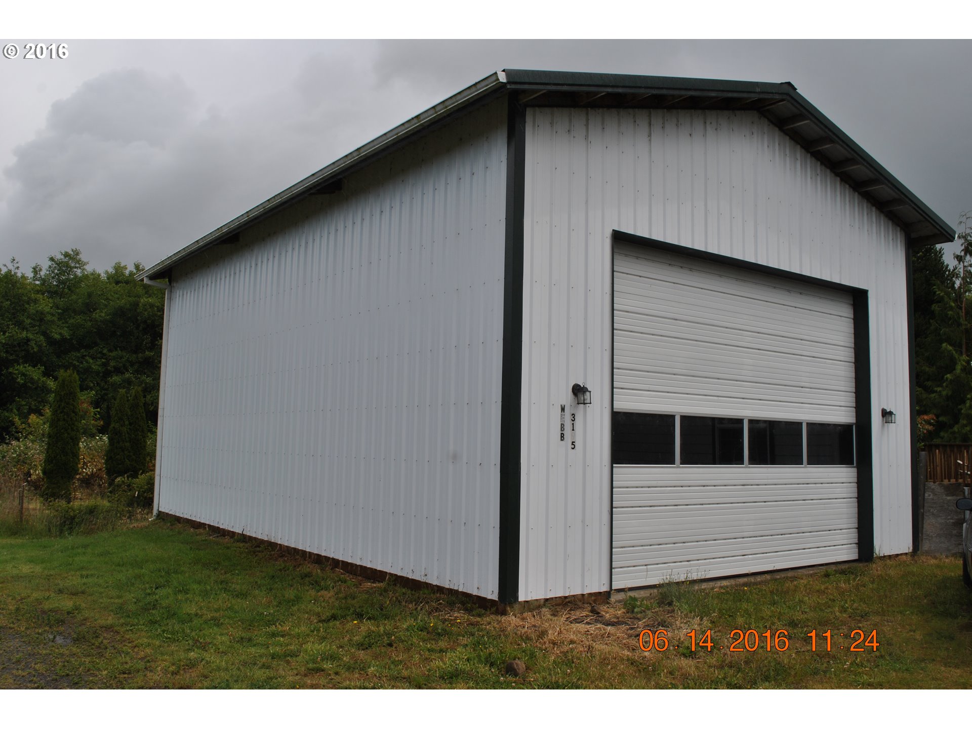 3195 Goeres Road Tillamook, OR 97141 - Photo 3 of 26 a house with yard