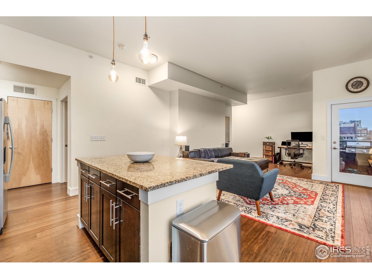 204 Maple Street, Unit 301 Fort Collins, CO 80521 - Photo 13 of 26 a kitchen with a stove and a refrigerator
