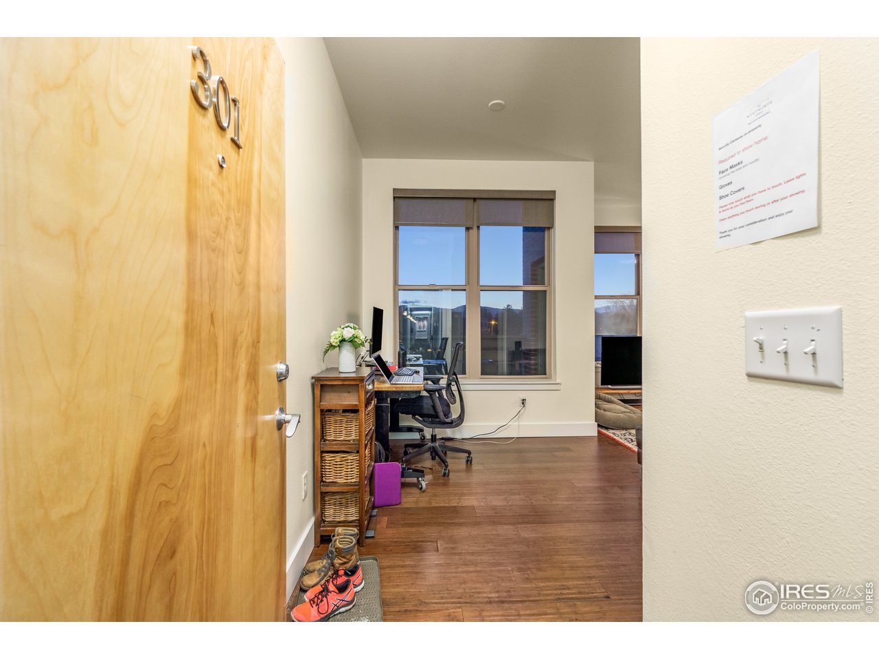 204 Maple Street, Unit 301 Fort Collins, CO 80521 - Photo 23 of 26 a living room with furniture and a table