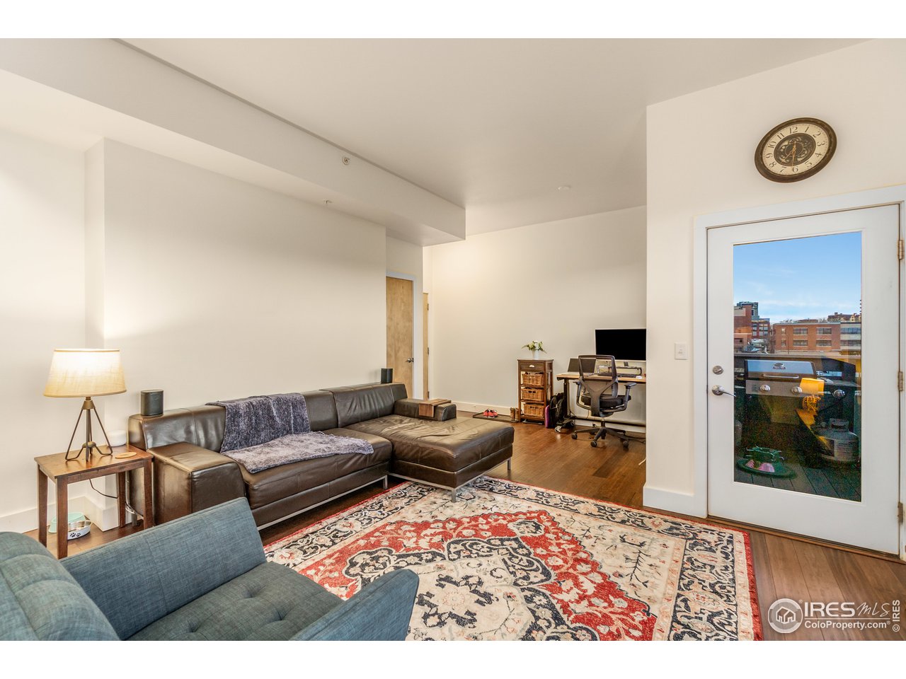 204 Maple Street, Unit 301 Fort Collins, CO 80521 - Photo 6 of 26 a living room with furniture and a window