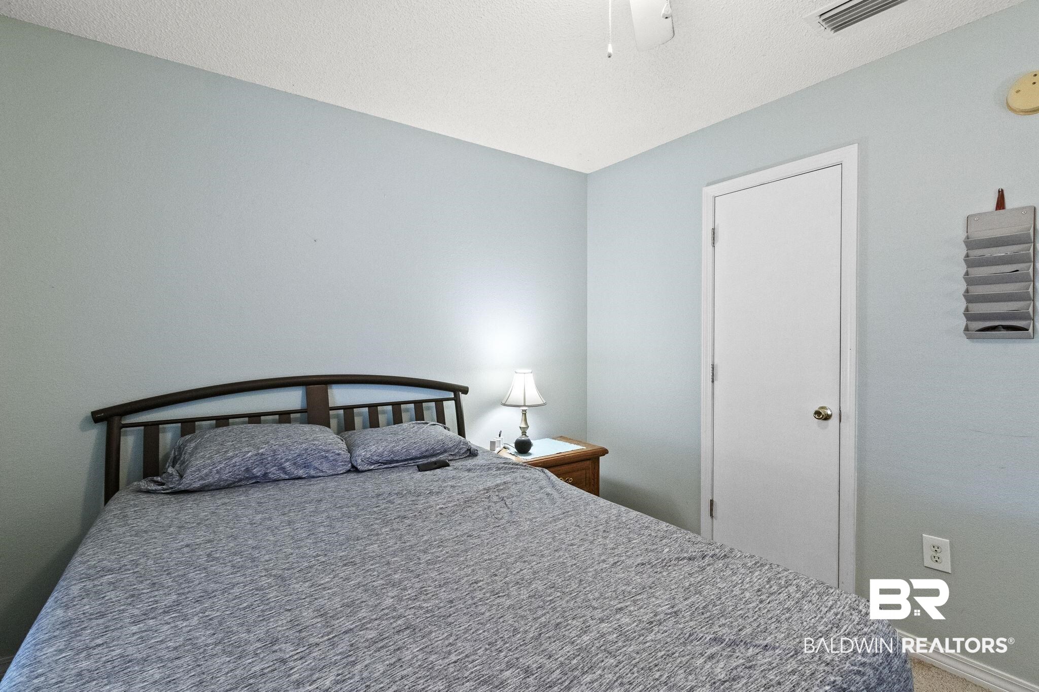 14031 Brook Hollow Road Summerdale, AL 36580 - Photo 34 of 56 Carpeted bedroom featuring ceiling fan