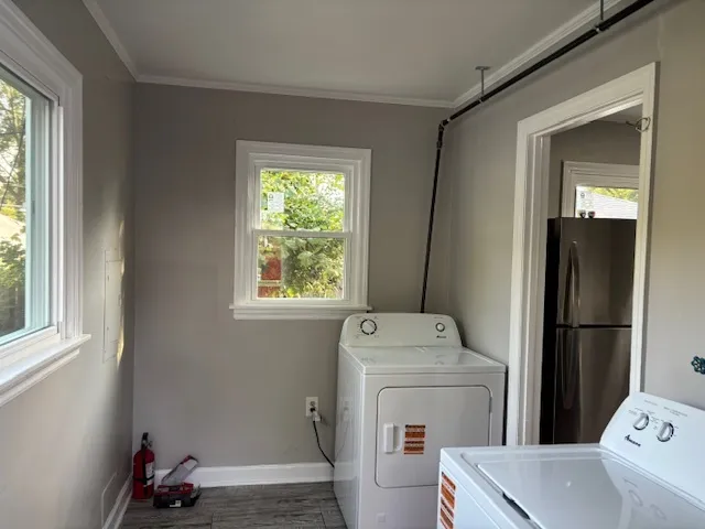 a utility room with dryer and washer