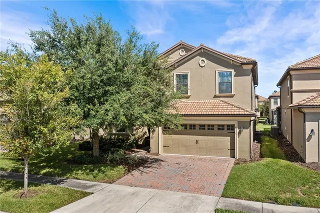 a view of front of house with a yard