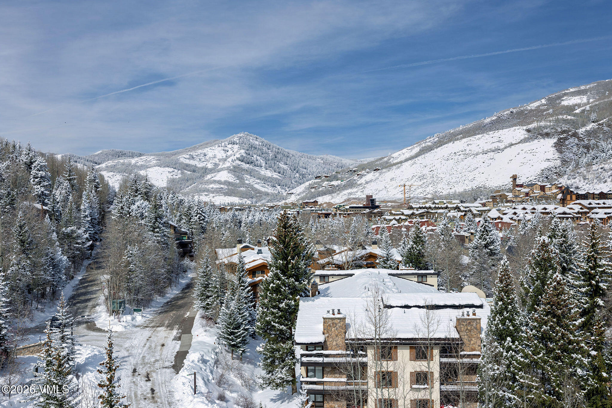 200 Vail Road, Unit 799 Vail, CO 81657 - Photo 30 of 32 a view of a large building with a mountain