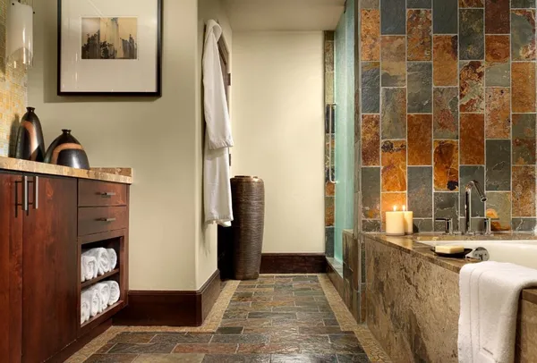 a view of a bathroom with sink and mirror