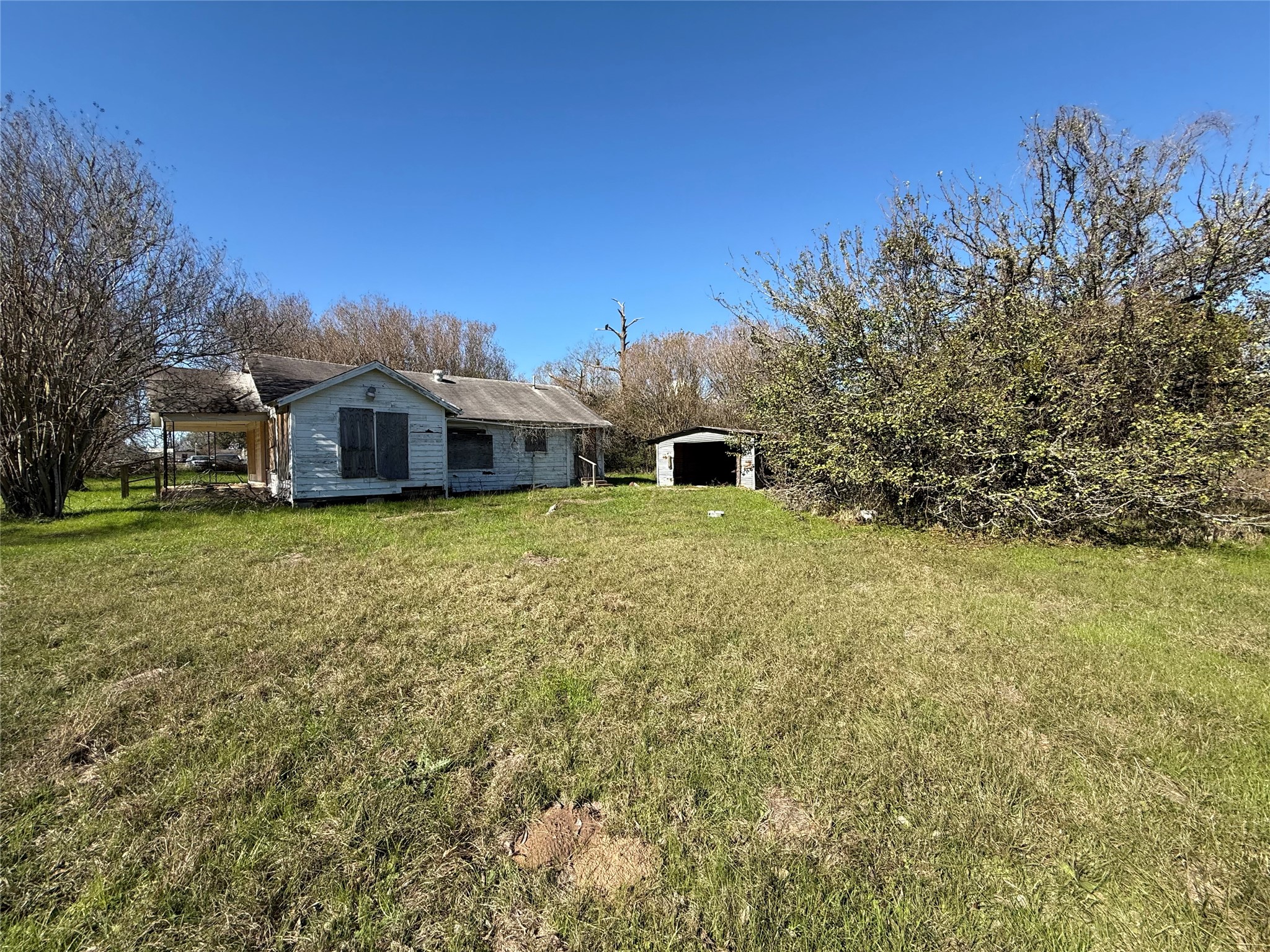 10 Foster Lane Hempstead, TX 77445 - Photo 2 of 9 a view of a swimming pool with an outdoor space and seating area