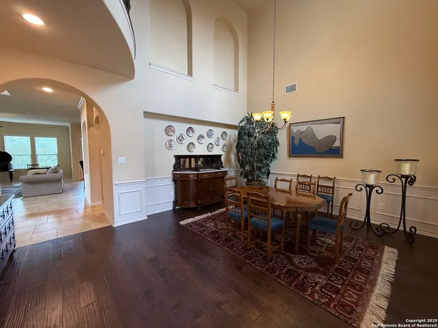 a view of a dining room with furniture