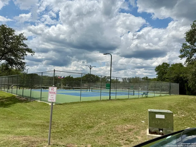 a view of a garden with a terrace