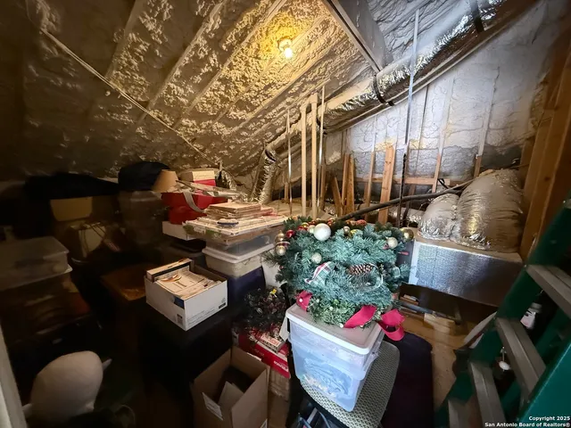 a view of a chairs and table in a patio