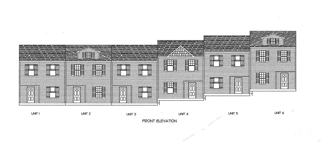 a black and white building with a outdoor space