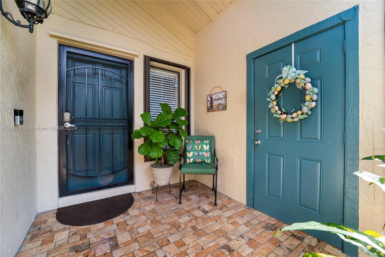 11310 Southwest 115th Terrace, Unit 11310 Miami, FL 33176 - Photo 2 of 13 a front view of a house