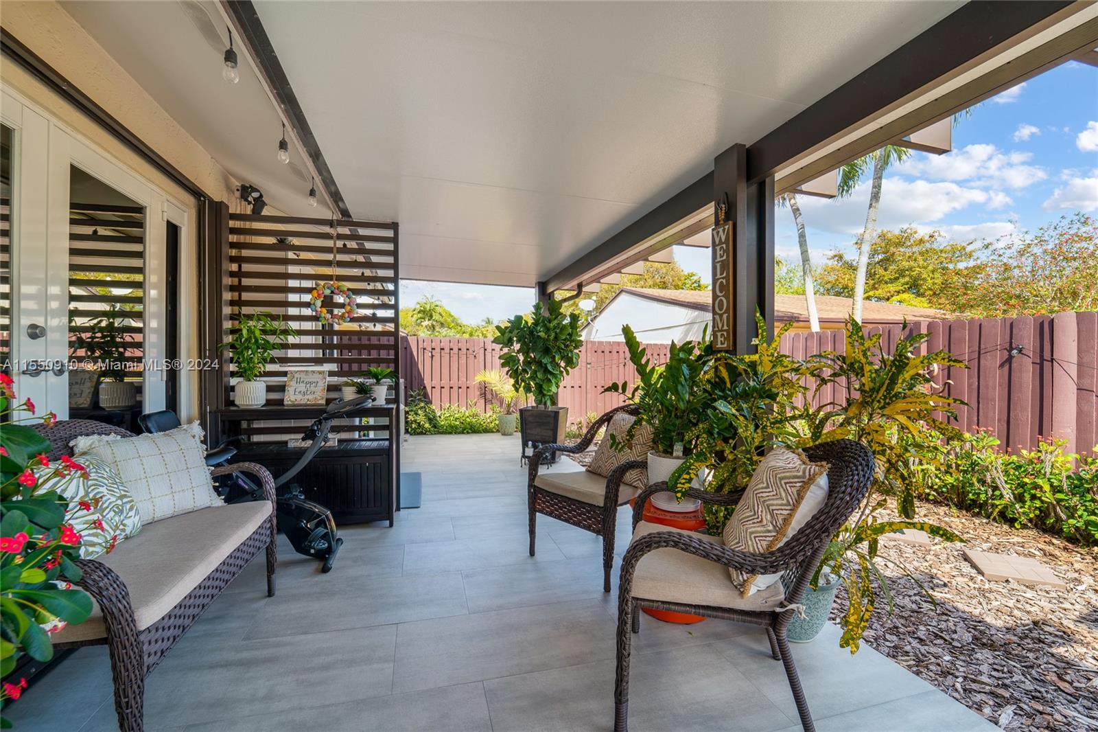 11310 Southwest 115th Terrace, Unit 11310 Miami, FL 33176 - Photo 3 of 13 a outdoor living space with furniture