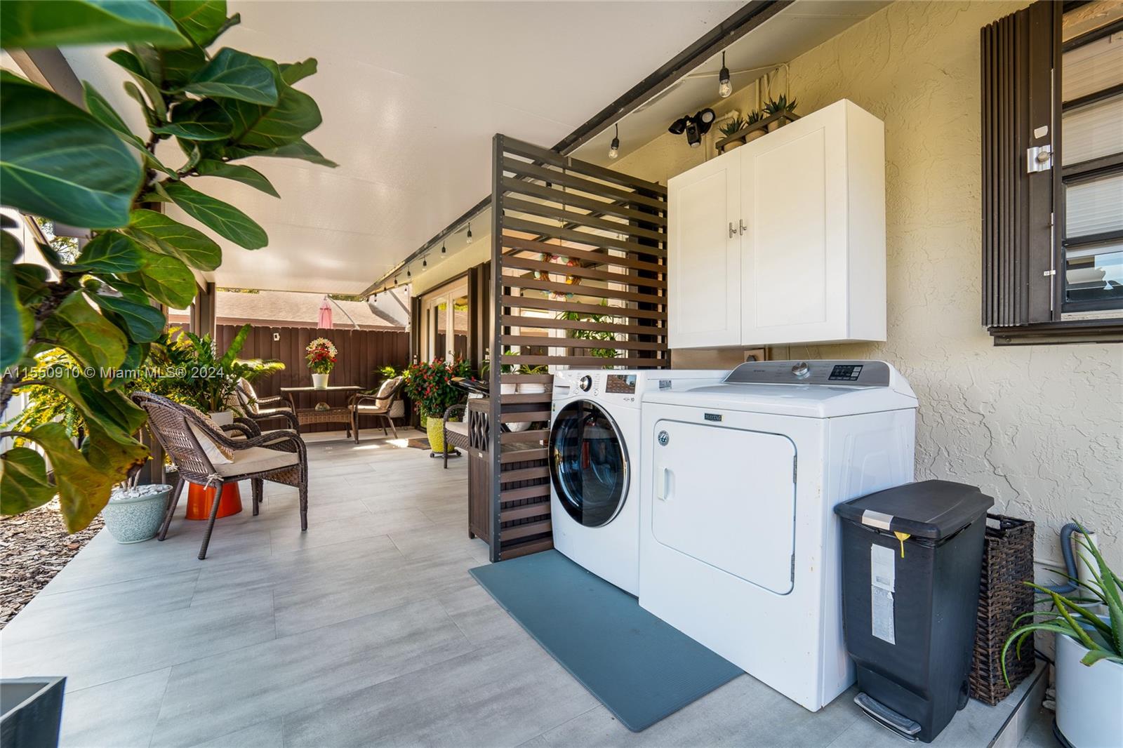 11310 Southwest 115th Terrace, Unit 11310 Miami, FL 33176 - Photo 7 of 13 a utility room with dryer and washer