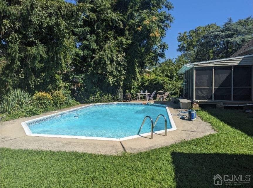 22 Wilcox Road New Brunswick, NJ 08901 - Photo 11 of 12 a view of a backyard with swimming pool