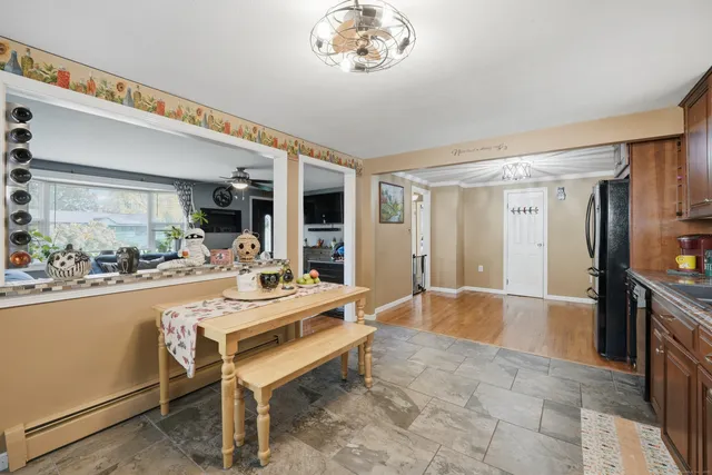 a very nice looking dining room with a table and chairs