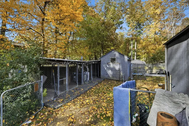 a backyard of a house with seating space
