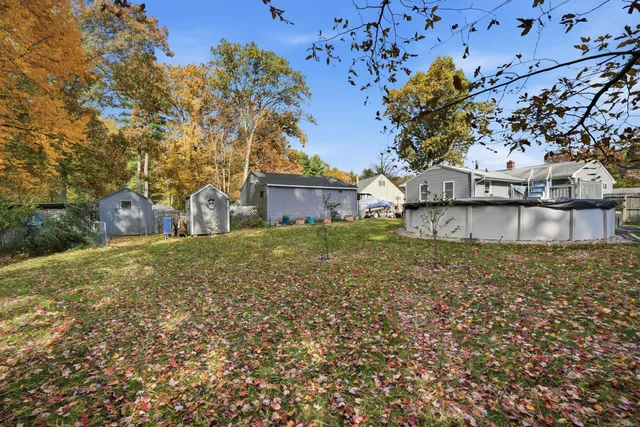 a view of a house with a yard