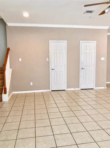 a view of an empty room and window