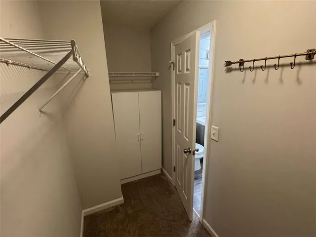 a view of a room with racks on the wall