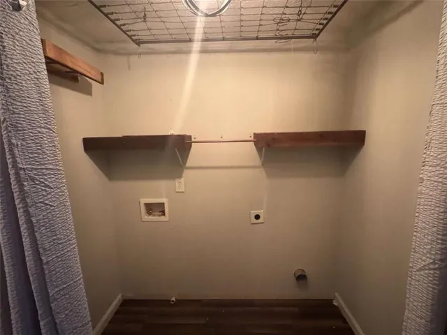 a aerial view of a house with a yard and garage