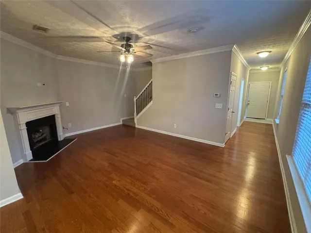 a view of livingroom and hardwood floor