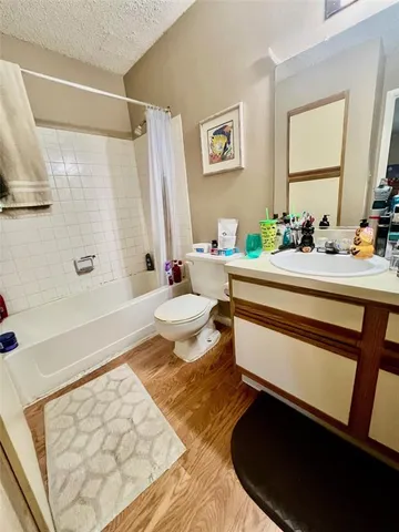 a view of front door with wooden floor
