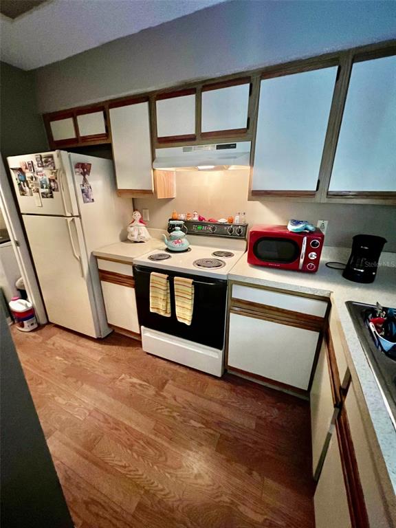 224 Afton Square, Unit 202 Altamonte Springs, FL 32714 - Photo 4 of 13 a room with storage and utility