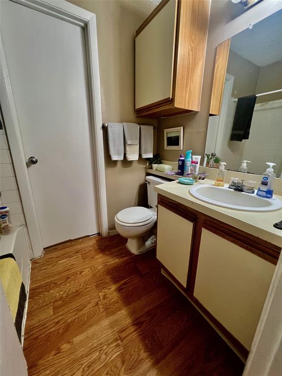 224 Afton Square, Unit 202 Altamonte Springs, FL 32714 - Photo 9 of 13 a bathroom with a sink toilet and mirror