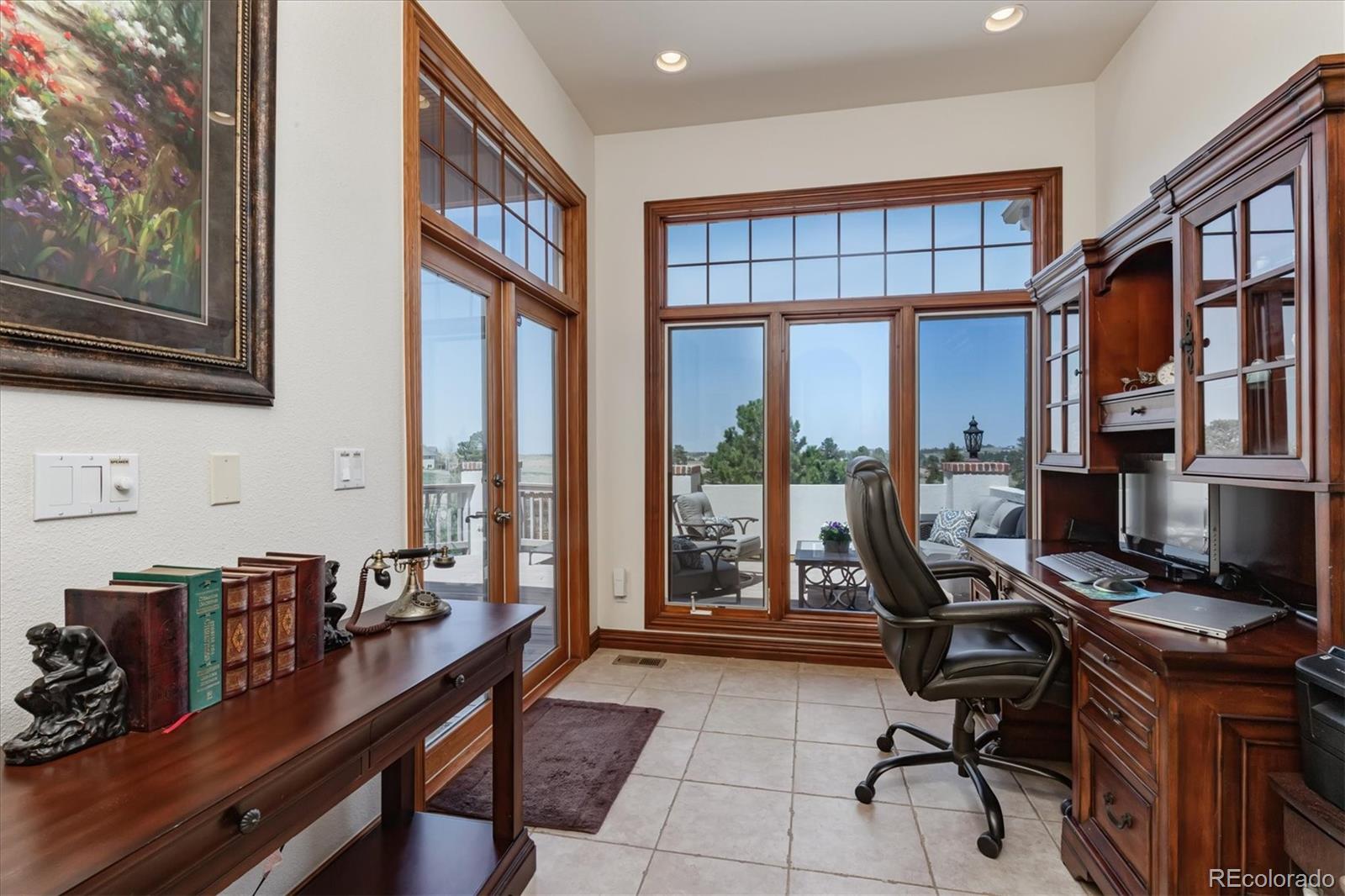 12080 Summit Ridge Road Parker, CO 80138 - Photo 10 of 39 a work room with furniture