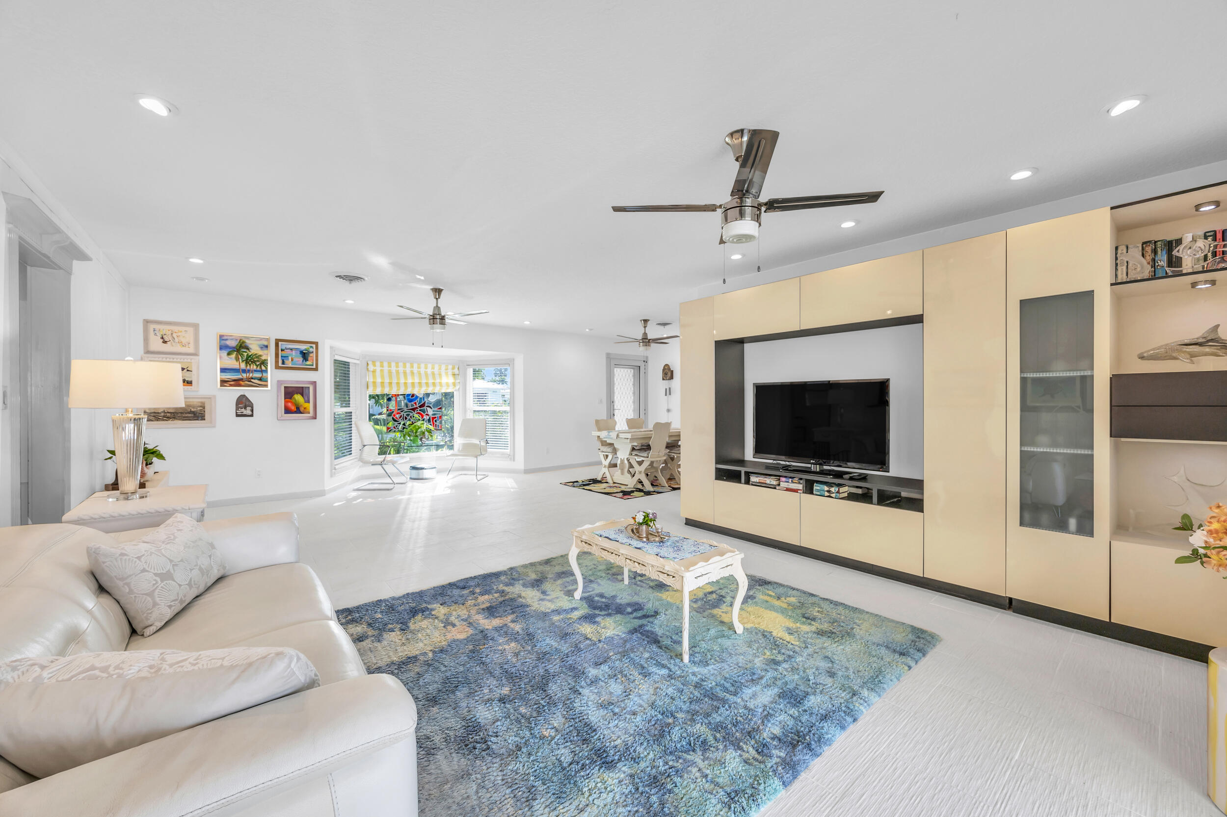 910 Dolphin Drive Jupiter, FL 33458 - Photo 9 of 29 Roomy storage/tv area