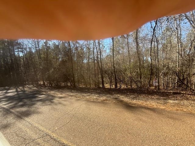 10 Harris Road Bolivar, TN 38008 - Photo 9 of 11 a view of a street with a building in the background