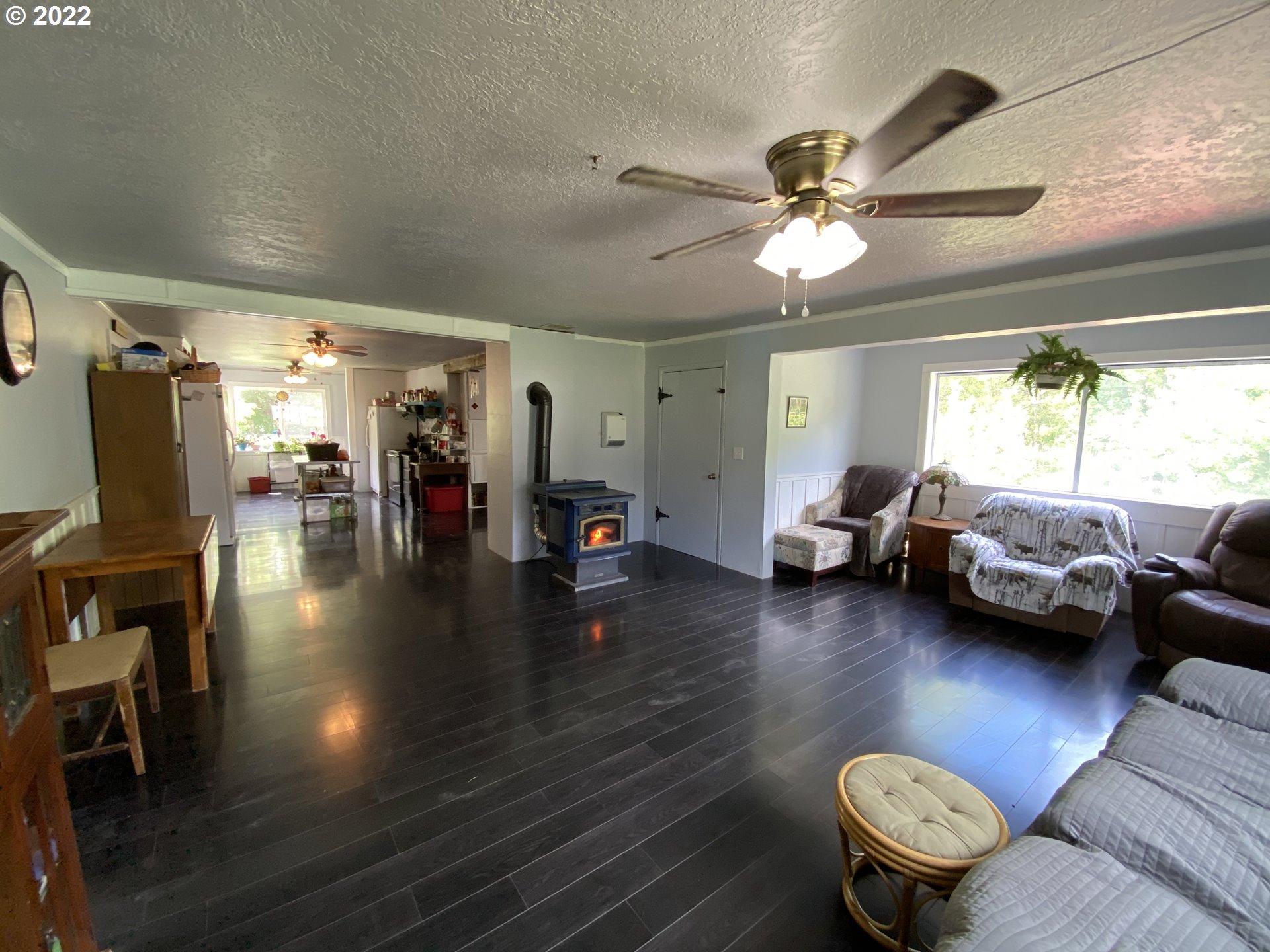 3005 Shoestring Road Riddle, OR 97469 - Photo 6 of 32 a living room with furniture and a large window