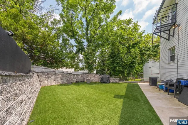 a view of a backyard with a garden