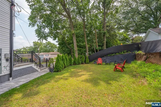a backyard of a house with seating space
