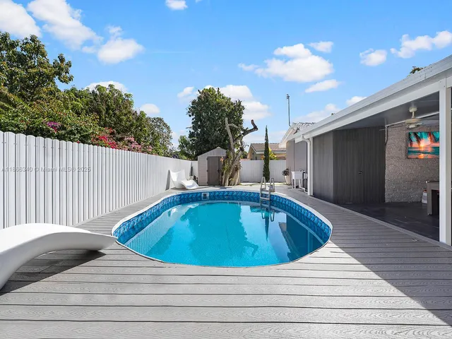 a view of roof deck with patio