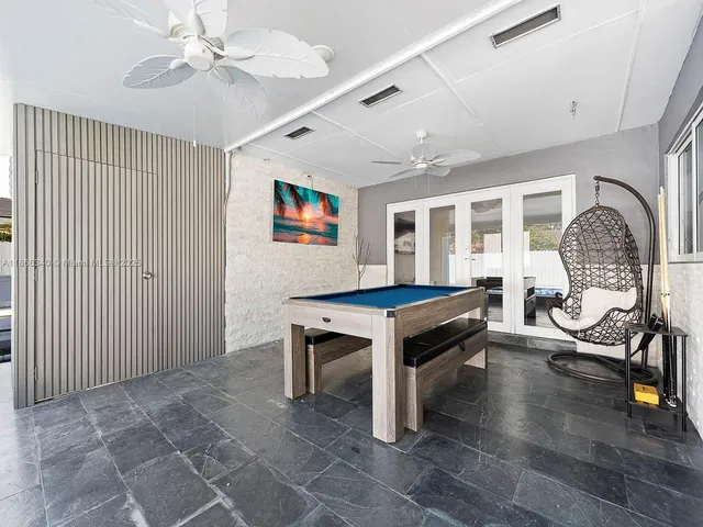 a view of a house with a swimming pool