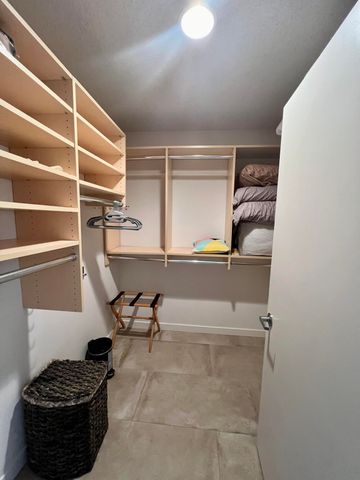 a view of living room with furniture and flat screen tv