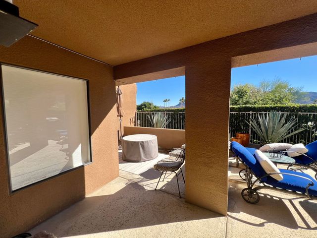 an aerial view of residential house and sandy dunes