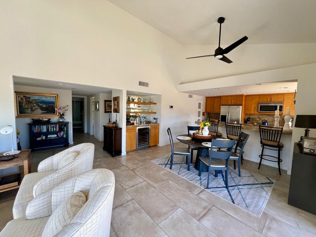 a kitchen with stainless steel appliances granite countertop a stove and a sink