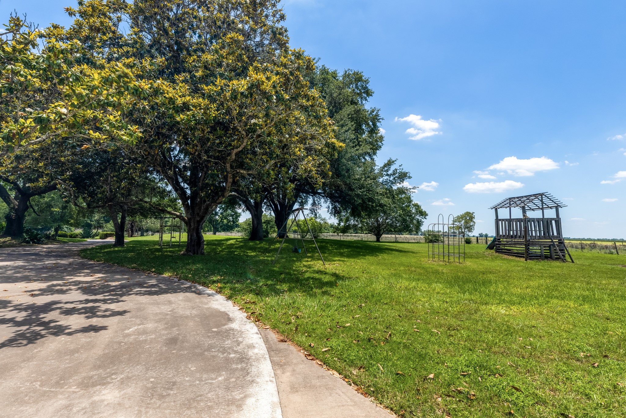 2009 FM 950 Road Eagle Lake, TX 77434 - Photo 20 of 27 a view of a park with large trees