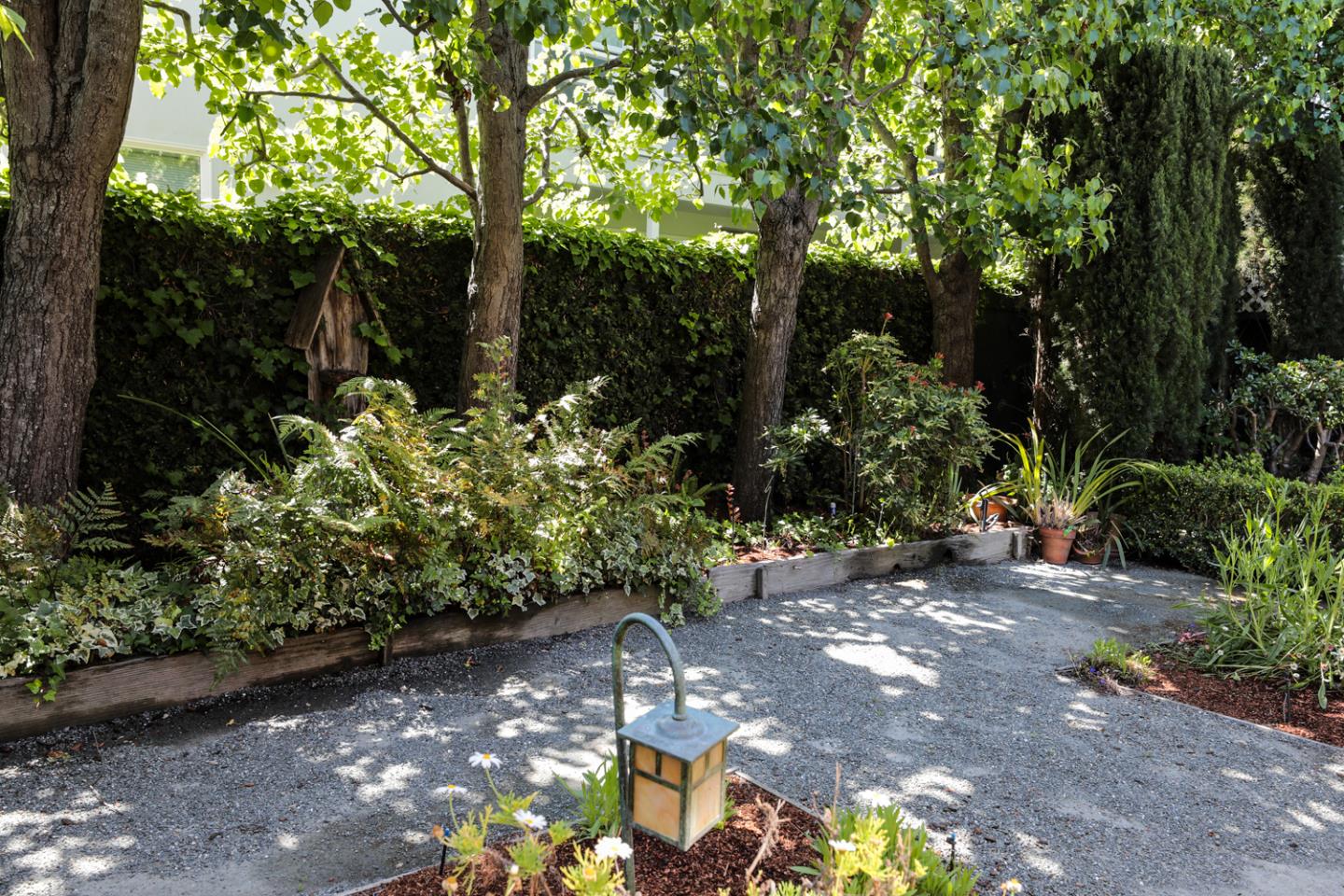 1145 Pine Street Menlo Park, CA 94025 - Photo 23 of 25 a view of a garden with flowers